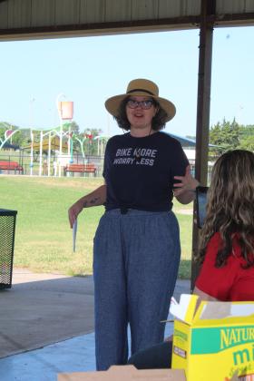 Holly Gordon with the Gateway to Prevention TSET Healthy Living Program speaks about walking audits during the June 8 Tecumseh Area Guides (TAG) meeting, held at Slick Humphrey Park where there is now a second 1/2-mile walking trail. Countywide &amp; Sun/Natasha Dunagan