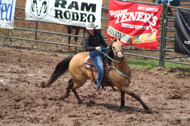 Megyn Alls of Shawnee competes in barrel racing.