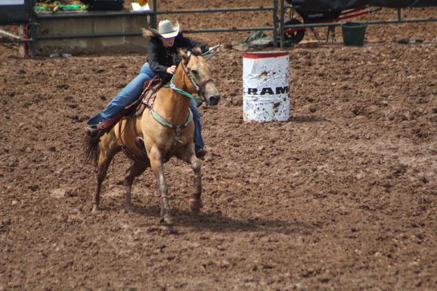 Megyn Alls of Shawnee competes in barrel racing.