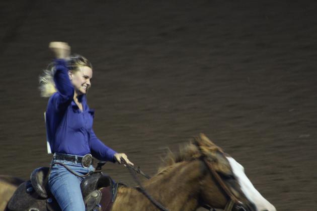 Kacey Bass of Brenham, TX, celebrates after winning the Barrel Racing finals of the IFYR for the second year in a row on July 14. Countywide &amp; Sun/Natasha Dunagan