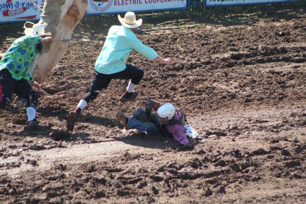 Jeffrey Bixler of Marshall, AR, competes in bull riding on July 10.