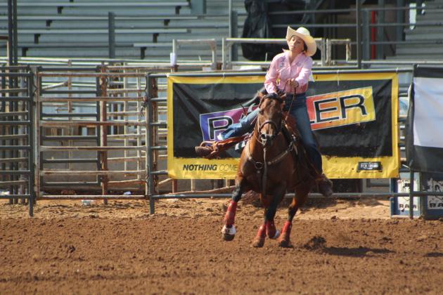 Bella Branham of Tecumseh finishes her second round of barrel racing at the IFYR on July 13. Countywide &amp; Sun/Natasha Dunagan