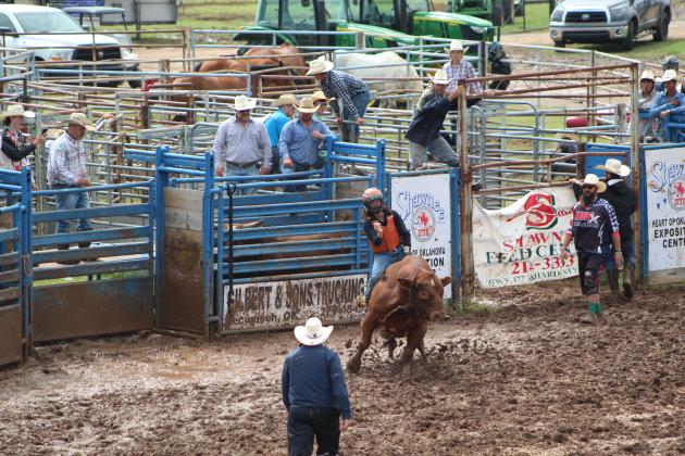 Ryker Butler of McLoud competes in bull riding at the IFYR on July 11.