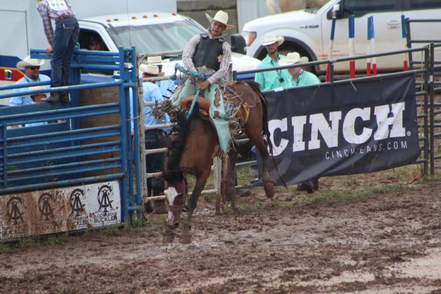 Parker Matthews of Joplin, MO, competes in the Saddle Bronc event of the IFYR on the morning of July 11. Countywide &amp; Sun/Natasha Dunagan