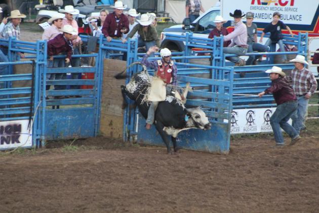 Marco Rizzo of Quitman, GA, competes in the bull riding on July 10.