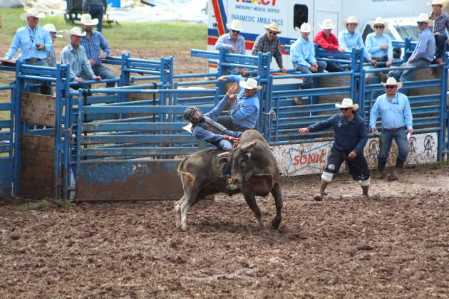 Carter Shaw of Haughton, LA, competes in bull riding on July 11.