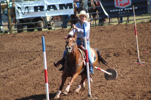 Krysta Theriot of Lafayett, LA, keeps going after knocking a pole down at the IFYR on July 13. Countywide &amp; Sun/Natasha Dunagan