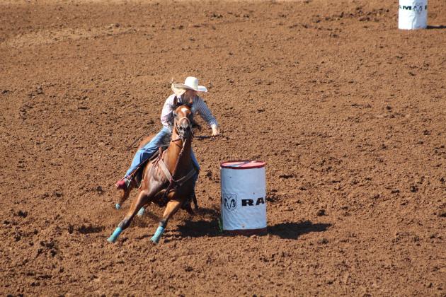 Madison Van Brunt of Shawnee competes in the barrel racing event of the IFYR on the morning of July 10. Countywide &amp; Sun/Natasha Dunagan