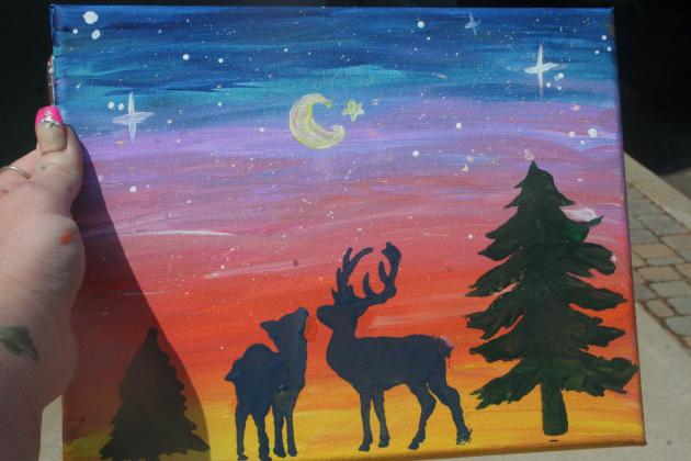 A sunset nature painting is shown that Lizzy Brady, who owns SageBrush Designs, taught the teens how to create at the Tecumseh Public Library's Summer Learning Event on Wednesday, June 21. Countywide &amp; Sun/Valerie Scott