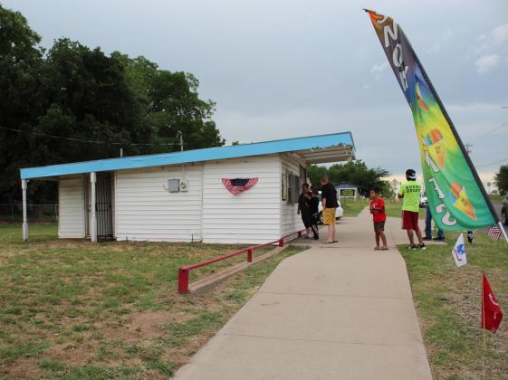 Customers order from Epic Sno Cones on July 3. The snow cone stand has been in business since 1952 and has had four owners. Its current owner, David Henry, opened on June 1. Countywide &amp; Sun/Natasha Dunagan