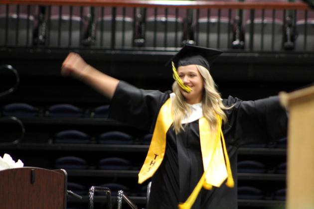 Tecumseh graduate Sadie Boatman has a moment of joy before receiving her diploma during the THS Commencement Ceremony on May 17 at FireLake Arena. Countywide &amp; Sun/Natasha Dunagan