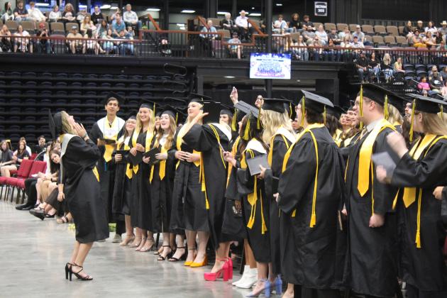 Tecumseh graduate and former Countywide &amp; Sun intern Adriana Fincher leads her classmates in the T-Town Chant during the THS Commencement Ceremony on May 17 at FireLake Arena. Tecumseh graduated 143 seniors this year. Countywide &amp; Sun/Natasha Dunagan