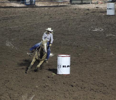 Cassidy Wilson of Shawnee rounds the second barrel during the International Finals Youth Rodeo on the night of July 9.