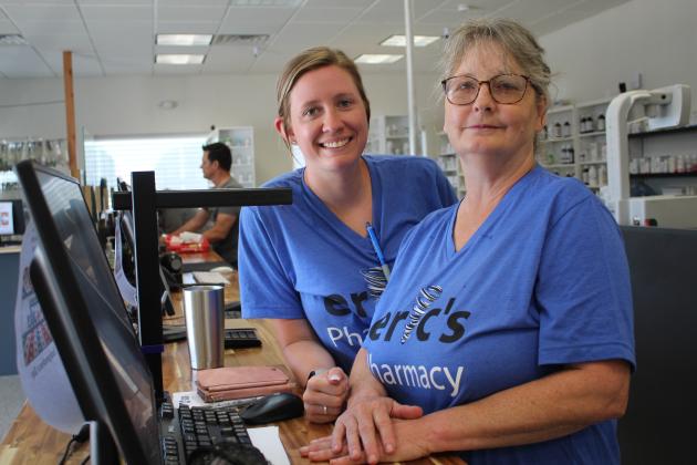 Pharmacy Technicians Veronicah Birmingham and Paula Whitlock are ready to help customers at the new Eric's Pharmacy location, 4151 N. Harrison, Shawnee.