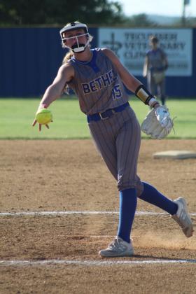 Bethel freshman Kinley Anthony slings the ball past home plate during the fourth inning of the home game with Casady on Aug. 11. The Lady Wildcats won, 13-1. Countywide &amp; Sun/Natasha Dunagan
