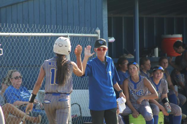 Bethel sophomore Layla Menhusen gets a high five from Head Coach Tara Satterfield after hitting a home run on Aug. 11. Countywide &amp; Sun/Natasha Dunagan