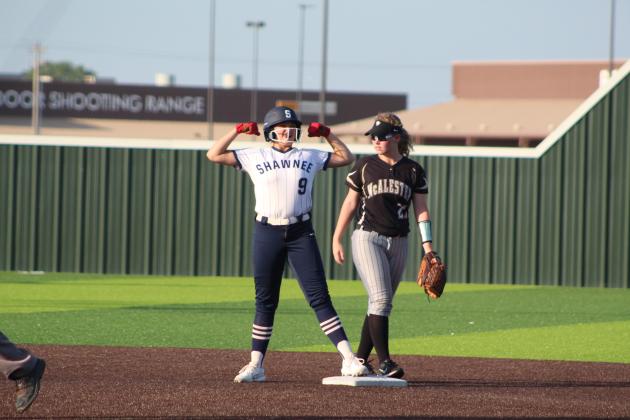 Shawnee freshman Abi Clements flexes her muscles after hitting a double during the McAlester game in the Shawnee Softball Tournament, held at FireLake Ball Fields on Aug. 24. The Lady Wolves lost 6-25. Countywide &amp; Sun/Natasha Dunagan