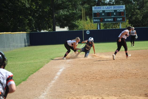 Asher sophomore Cadence Leba steals third.