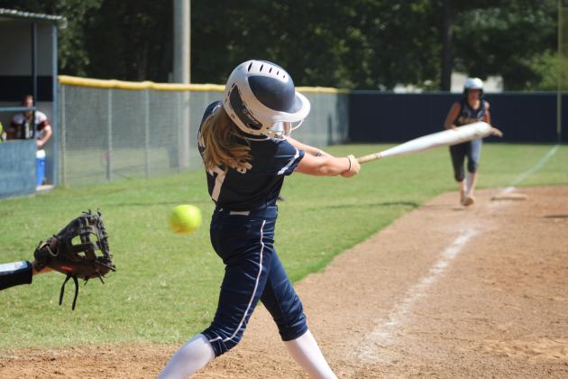 Asher freshman Mackenzie Thompson has a swing and a miss while at bat. Countywide &amp; Sun/Natasha Dunagan