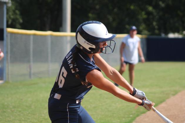 Asher senior Payton Leba hits a double and causes one run batted in (RBI) during the Asher Softball Tournament, in their first game with Wayne on Aug. 25. The Lady Indians won 2-1. Countywide &amp; Sun/Natasha Dunagan