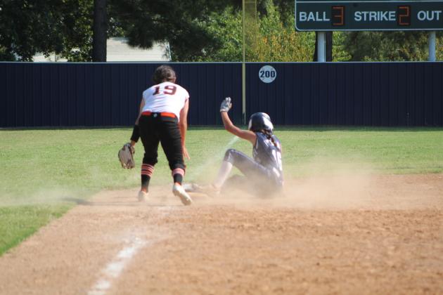 Asher Payton Leba slides into third base.