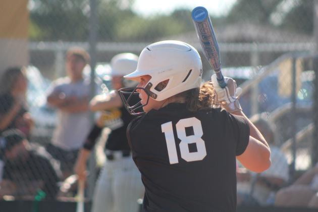 Tecumseh junior Katie Overstreet prepares to hit a home run in the second inning of the home game with Cleveland on Aug. 14. The THS fast pitch team won, 17-0. Countywide &amp; Sun/Natasha Dunagan