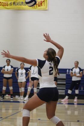 Shawnee's Kalieo Citizen locks her gaze on the ball as she serves in their third game against Duncan on Aug. 24. The varsity volleyball team is playing at the Shawnee Middle School gym this year due to tornado damage at the Performing Arts and Athletic Center. They lost, 0-3. Countywide &amp; Sun/Natasha Dunagan