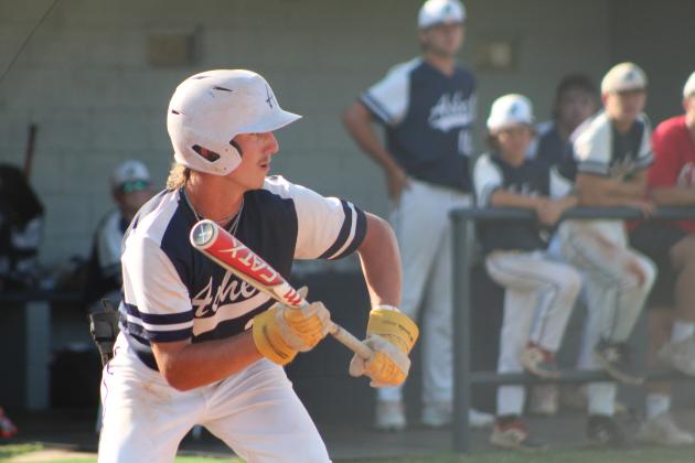 Asher junior Raygan Kuhlman tries for a bunt in the fourth inning of the Sept. 5 game with Byng. The Indians lost, 2-7. Countywide &amp; Sun/Natasha Dunagan