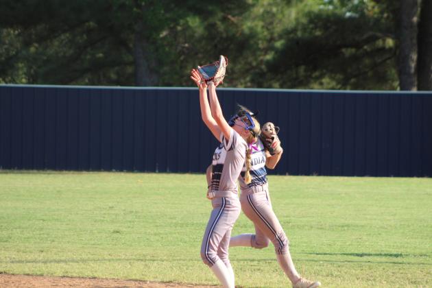 Asher freshman Mackenzie Thompson looks to make the catch for a third out in the second inning with Roff on Sept. 5. Countywide &amp; Sun/Natasha Dunagan
