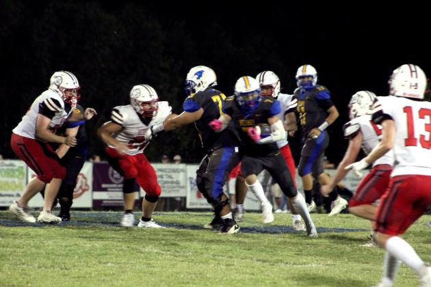 Bethel's Luke Quinter (#7) gains some yardage in the home game with McLoud on Sept. 8. Despite leading most of the game, the Wildcats lost, 21-28. Countywide &amp; Sun/Natasha Dunagan