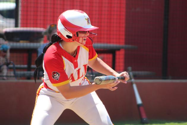 Dale’s Karsen Griggs bunts for a single in the game with Byng on Sept. 7.