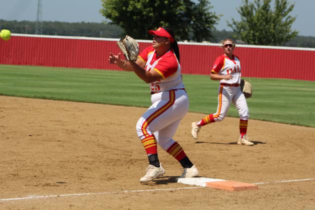Dale first baseman Kelbey Welcher prepares to make the catch for an out in the game with Byng.