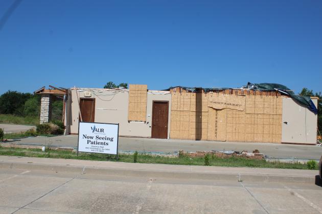 The Valir Physical Therapy Kickapoo location received extensive tornado damage, and parts of their building blew into the Shawnee VA Clinic location.