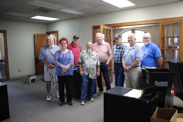 Members of the Shawnee Veterans Memorial Committee and a few others toured the former Shawnee Carnegie Library - and most recently District Attorney's Office - on Sept. 5 in consideration of turning it into a Veterans Museum. Shown, from left, are Gordon Richards, Jr., Barbara White, Al Brase, James Bryce, Price, Bob Winchell, Ford and James Wear.