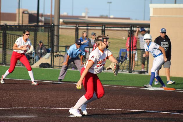 With action all around her, Dale junior Kinsley Hill focuses on slinging the ball past home in the seventh inning of the Class 2A State Semifinals, Oct. 6 at FireLake Ball Fields. The Lady Pirates beat Haskell, 2-0, and went on to win the State Championship, held at OSU. They faced Pocola and came out on top, 2-0, on Oct. 7. Countywide &amp; Sun/Natasha Dunagan