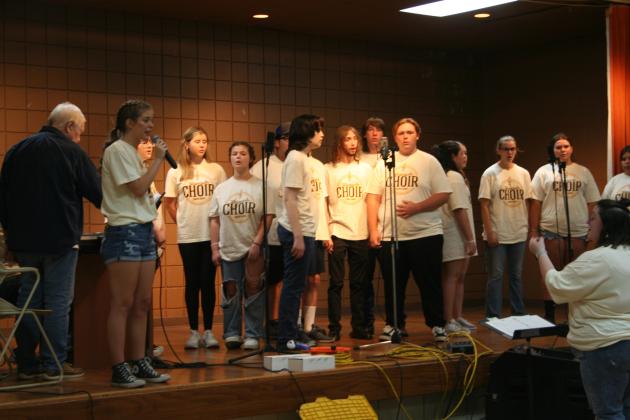 The Tecumseh High School Choir performs "Hello" by Adele in the City Hall Auditorium during Frontier Days on Sept. 30. The Middle School Choir also sang, and both participated in the parade. Countywide &amp; Sun/Natasha Dunagan