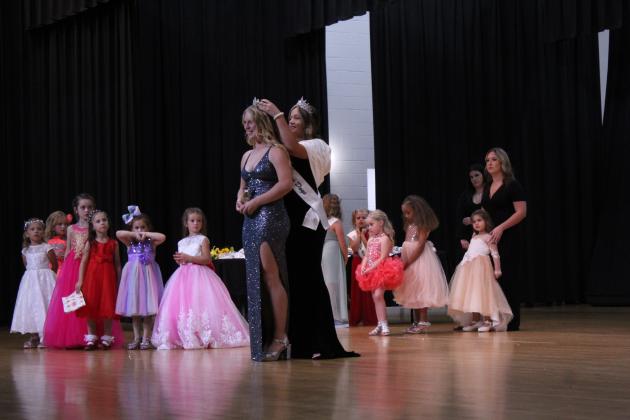 Miss Frontier Days contestant Aleigha McCullough is crowned Miss Congeniality by 2022 Miss Frontier Days Sadie Boatman during the Frontier Days Pageant on Sept. 24. McCullough also won the Talent portion in her age group for singing. Both the Junior and Miss contestants will see who won at 9:30 am on Sept. 30. Countywide &amp; Sun/Natasha Dunagan
