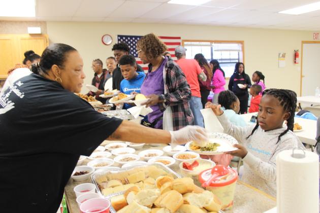 Brooksville 120th Celebration potluck line.