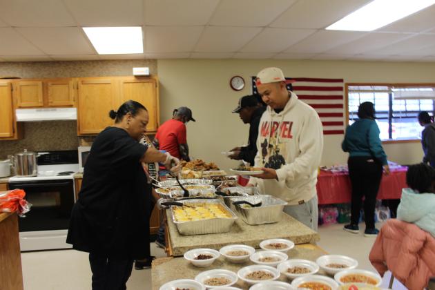 Brooksville 120th Celebration potluck line.