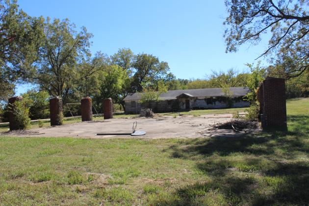 Carver Elementary School (now Brooksville City Hall) and the ruins of the high school gym