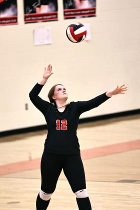 North Rock Creek's Ally Mafaffey serving during Regional Championship playoffs last week. NRC swept Tulsa Central. Then took on Cache winning three out of five matches. (25-21, 20-25, 16-25, 25-21, &amp; 15-8).  NRC will play today (Thursday) at Piedmont for the State Playoffs. Photo courtesy of Gowin Photography