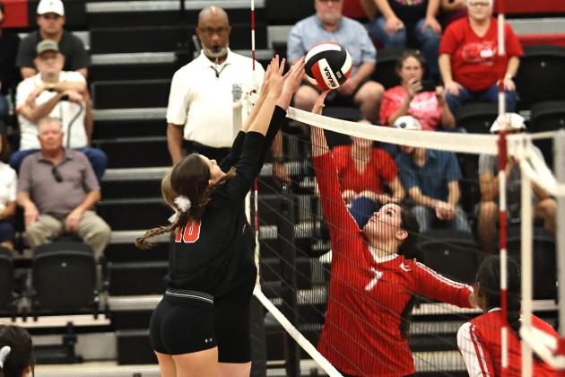 North Rock Creek's Brianna Ogden gets a block. Photo courtesy of Gowin Photography