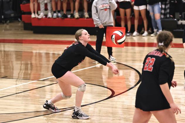 North Rock Creek's Ryleigh Lay with a dig in regional action last week. Photo courtesy of Gowin Photography