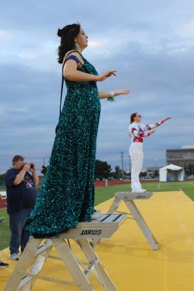 Shawnee Drum Major and Homecoming Queen Candidate Kaitlyn Parsons and fellow Drum Major Olivia Brem direct the Pride of the Pack Marching Band before the Homecoming game, Oct. 6 at OBU. Countywide &amp; Sun/Natasha Dunagan