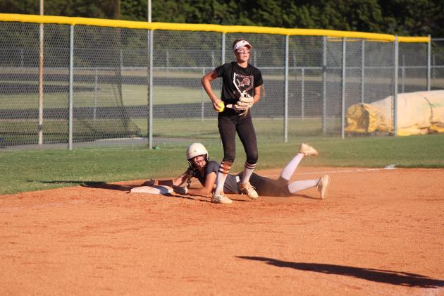 Tecumseh freshman Madison Gray slides as she steals third base during the Class 4A Fastpitch Softball Super Regionals on Oct. 5. This was in the second of three games with Blanchard over two days. The Lady Savages won the first game, 11-4; lost the second game, 2-4; and lost the third game in overtime, 6-8. They finish the season with a record of 32-6. Countywide &amp; Sun/Natasha Dunagan