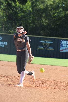 Tecumseh senior Serenity Jacoway hurls the ball over home plate during the Class 4A Fastpitch Softball Super Regionals on Oct. 5. This was in the second of three games with Blanchard over two days. The Lady Savages won the first game, 11-4; lost the second game, 2-4; and lost the third game in overtime, 6-8. They finish the season with a record of 32-6. Countywide &amp; Sun/Natasha Dunagan