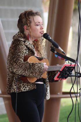 Miranda Mulkey sings onstage with a ukulele at the Woodland Veterans Park Grand Re-Opening on Nov. 11. Countywide &amp; Sun/Natasha Dunagan