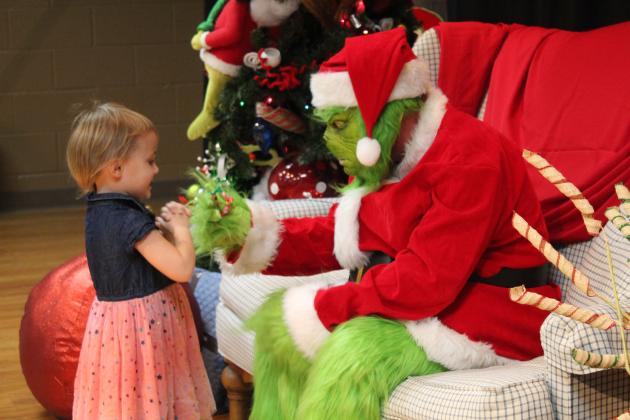 Pictures with the Grinch in Dec. 2022. File photo