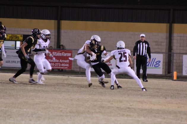 Tecumseh junior Darian Clark carries the ball in the second quarter of the Senior Night home game on Nov. 3. The Savages lost to Blanchard, 0-42. Countywide &amp; Sun/Natasha Dunagan