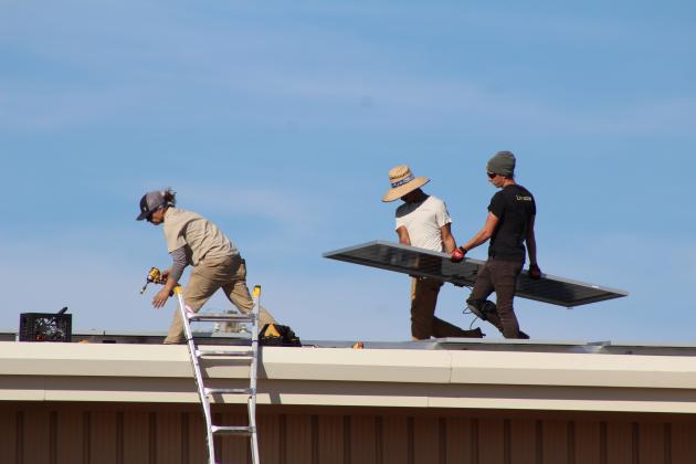 The crew of EightTwenty Solar work on installing 42 solar panels on the Earlsboro Elementary School building on Nov. 6. Principal Stacey Barton said he worked with OG&amp;E through the CLEAResult Program to make this happen. They were on a waiting list for the past five years. Countywide &amp; Sun/Natasha Dunagan